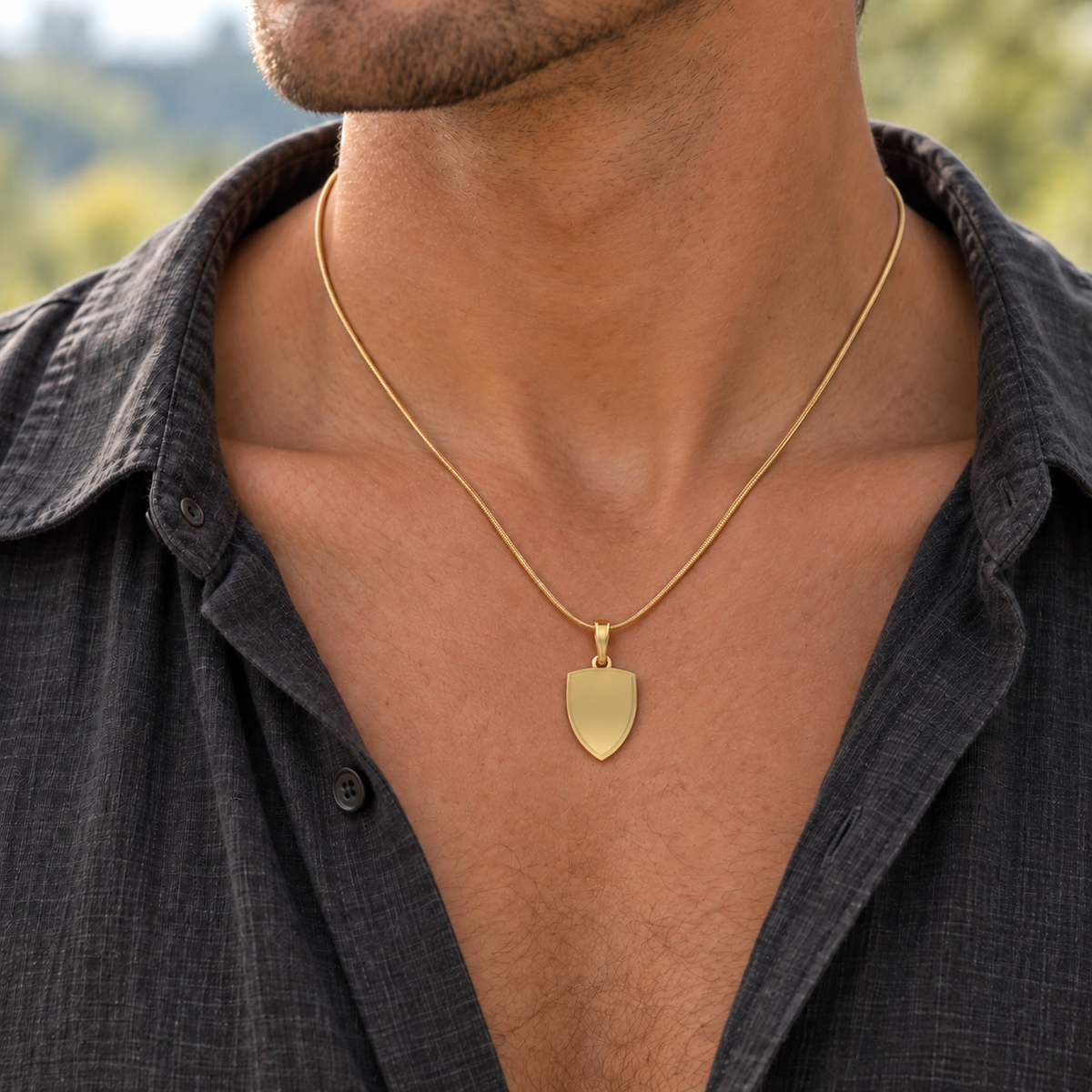 solid 14K yellow gold Remember Me Amulet keepsake pendant worn on an adult model