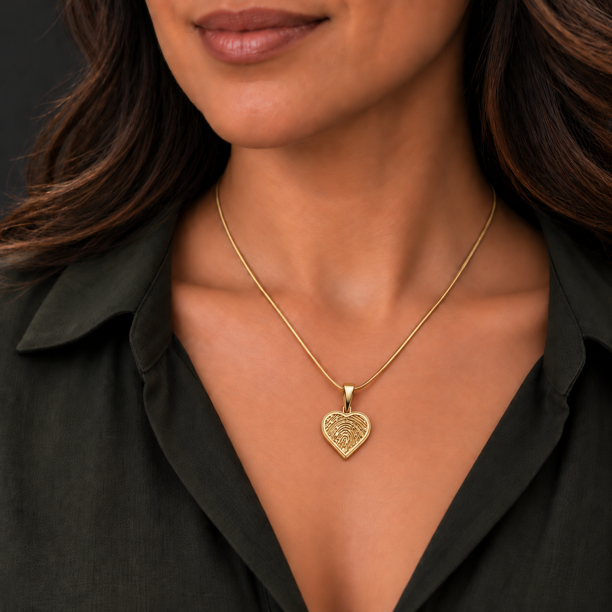 Gold plated heart fingerprint pendant — worn with a matching snake chain