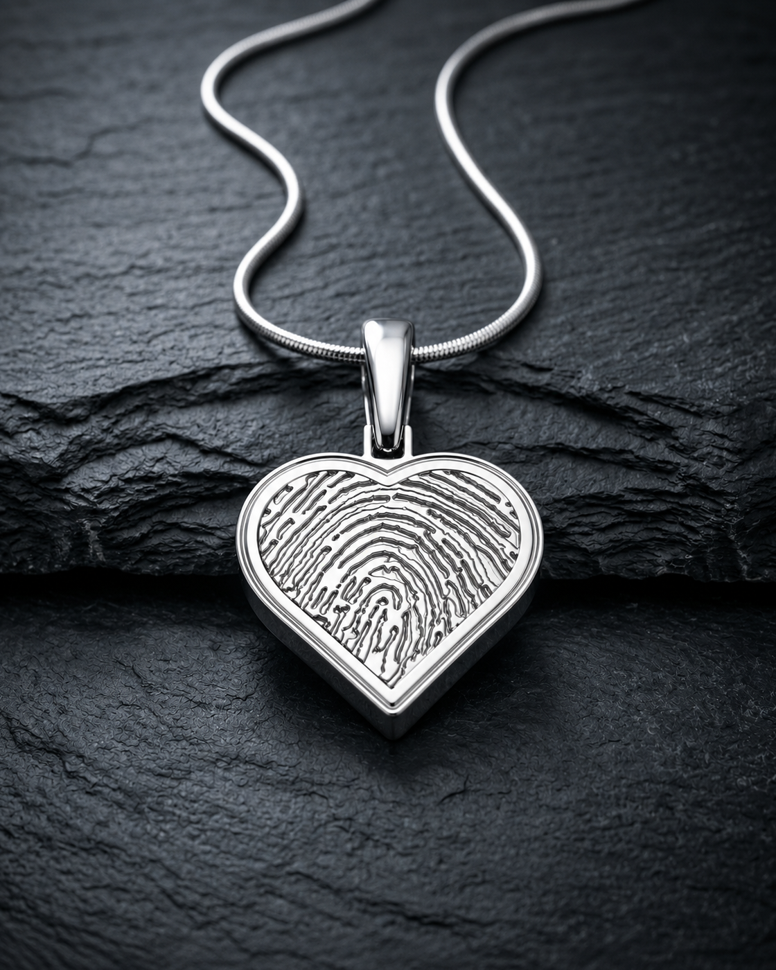Sterling silver heart fingerprint pendant — on charcoal slate