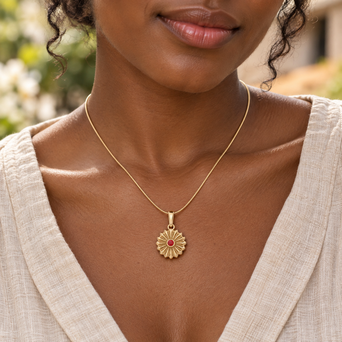 Solid 14K Gold Daisy Birthstone Permanently Sealed Waterproof Jewelry worn on an adult model