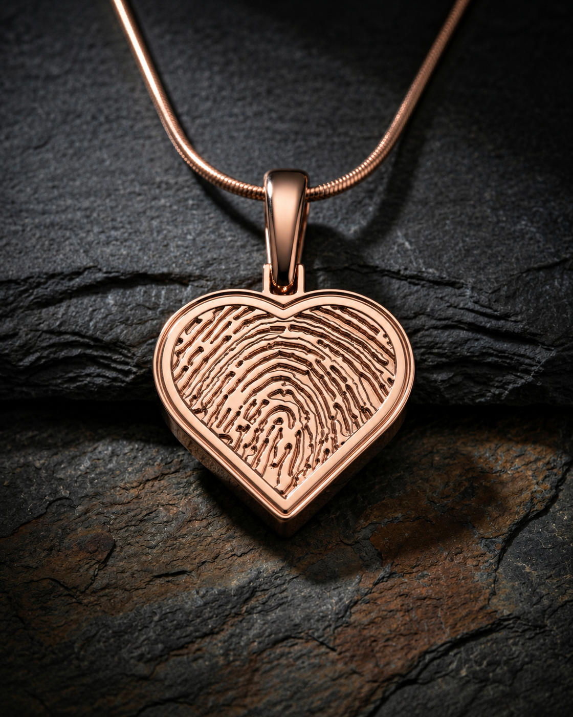 Rose gold plated heart fingerprint pendant — on charcoal slate