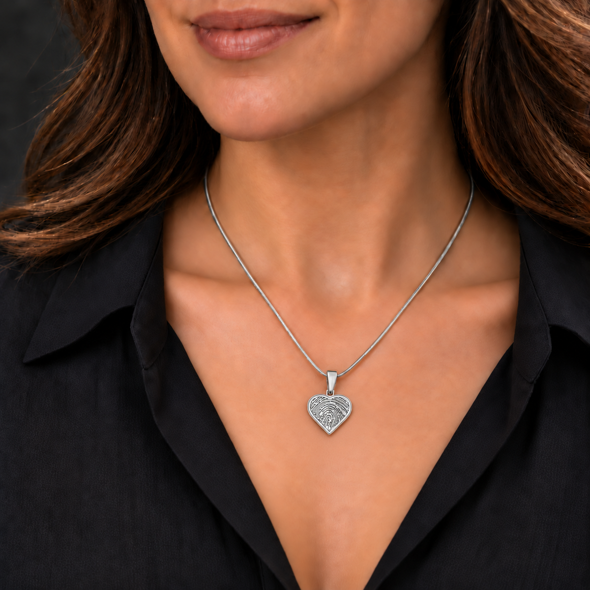 Sterling silver heart fingerprint pendant — worn with a matching snake chain